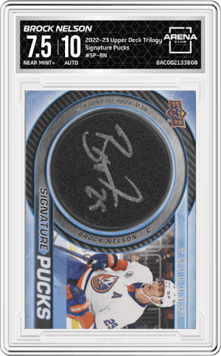 Brock Nelson from the 2022-23 Upper Deck Trilogy set graded by Arena Club and given an overall grade of 7.5.
