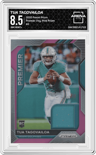 Tua Tagovailoa from the 2020 Panini Prizm set featuring a Pink Prizm parallel graded by Arena Club and given an overall grade of 8.5.