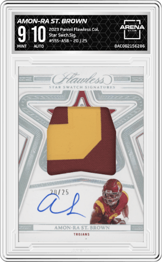 Amon-Ra St. Brown from the 2023 Panini Flawless Collegiate set graded by Arena Club and given an overall grade of 9.