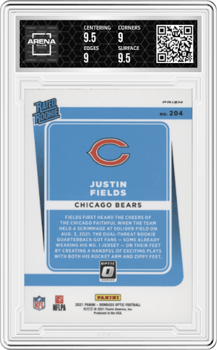 Justin Fields from the 2021 Panini Donruss Optic set featuring a Holo parallel graded by Arena Club and given an overall grade of 9.5.