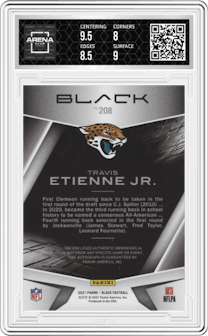 Travis Etienne Jr. from the 2021 Panini Black set featuring a Emerald parallel graded by Arena Club and given an overall grade of 8.5.
