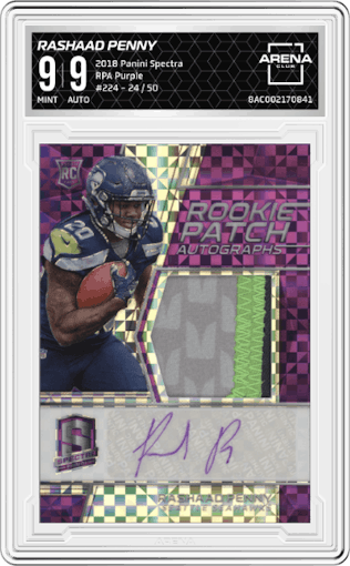 Rashaad Penny from the 2018 Panini Spectra set featuring a Purple parallel graded by Arena Club and given an overall grade of 9.