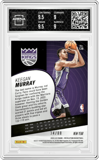 Keegan Murray from the 2022-23 Panini Revolution  set featuring a Chinese New Year Emerald parallel graded by Arena Club and given an overall grade of 9.5.