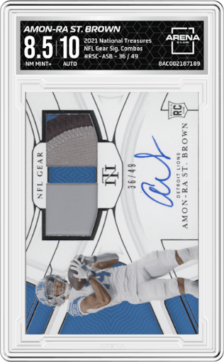 Amon-Ra St. Brown from the 2021 Panini National Treasures set graded by Arena Club and given an overall grade of 8.5.