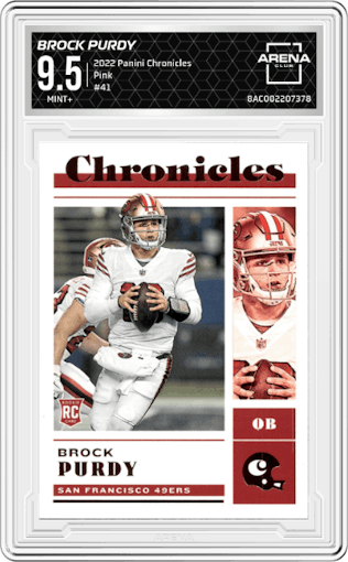 Brock Purdy from the 2022 Panini Chronicles set featuring a Pink parallel graded by Arena Club and given an overall grade of 9.5.