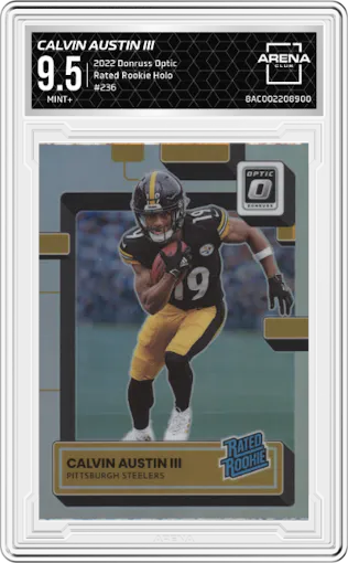 Calvin Austin III  from the 2022 Panini Donruss Optic set featuring a Holo parallel graded by Arena Club and given an overall grade of 9.5.