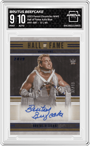Brutus Beefcake from the 2023 Panini Chronicles WWE set featuring a Blue parallel graded by Arena Club and given an overall grade of 9.
