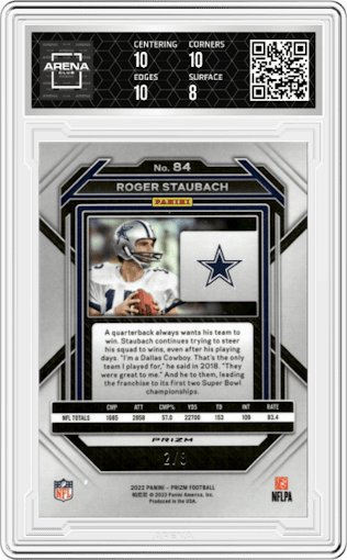 Roger Staubach from the 2022 Panini Prizm set featuring a Green Sparkle parallel graded by Arena Club and given an overall grade of 8.5.