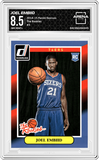 Joel Embiid from the 2014-15 Panini Donruss  set graded by Arena Club and given an overall grade of 8.5.