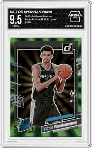 Victor Wembanyama from the 2023-24 Panini Donruss set featuring a Green Holo Laser  parallel graded by Arena Club and given an overall grade of 9.5.