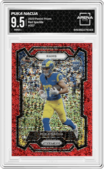 Puka Nacua from the 2023 Panini Prizm set featuring a Red Sparkle Prizm parallel graded by Arena Club and given an overall grade of 9.5.