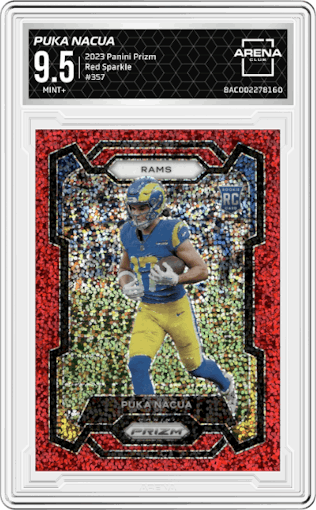 Puka Nacua from the 2023 Panini Prizm set featuring a Red Sparkle Prizm parallel graded by Arena Club and given an overall grade of 9.5.