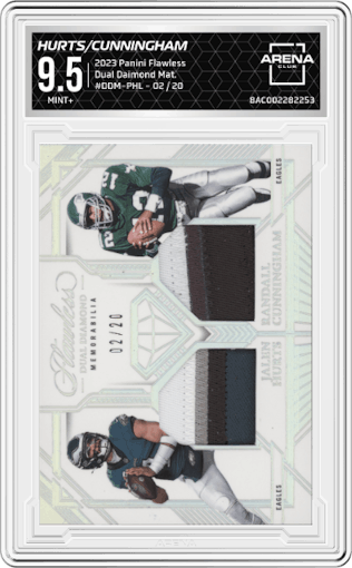 Jalen Hurts/Randall Cunningham from the 2023 Panini Flawless set graded by Arena Club and given an overall grade of 9.5.