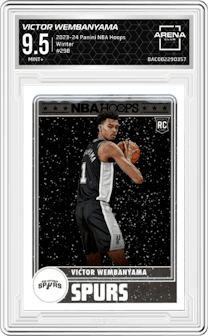Victor Wembanyama from the 2023-24 Panini NBA Hoops set featuring a Winter parallel graded by Arena Club and given an overall grade of 9.5.