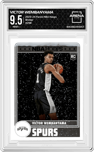 Victor Wembanyama from the 2023-24 Panini NBA Hoops set featuring a Winter parallel graded by Arena Club and given an overall grade of 9.5.