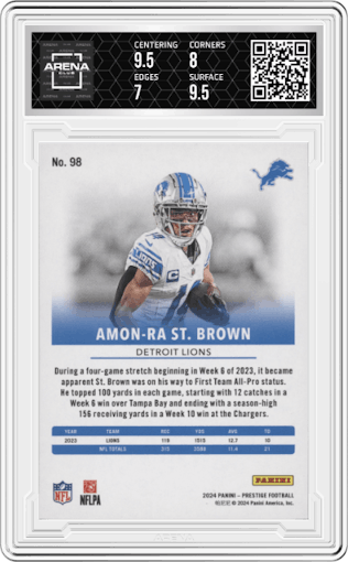 Amon-Ra St. Brown from the 2024 Panini Prestige  set featuring a Red Premium Xtra Points parallel graded by Arena Club and given an overall grade of 7.5.