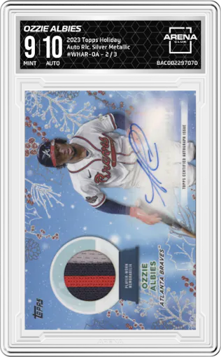 Ozzie Albies from the 2023 Topps Holiday set featuring a Silver Metallic parallel graded by Arena Club and given an overall grade of 9.