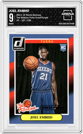 Joel Embiid from the 2014-15 Panini Donruss  set featuring a Press Proof Purple  parallel graded by Arena Club and given an overall grade of 9.