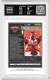 Dikembe Mutombo from the 2020-21 Panini One and One set featuring a Green parallel graded by Arena Club and given an overall grade of 9.