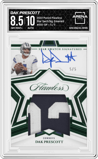 Dak Prescott from the 2022 Panini Flawless set featuring a Emerald parallel graded by Arena Club and given an overall grade of 8.5.