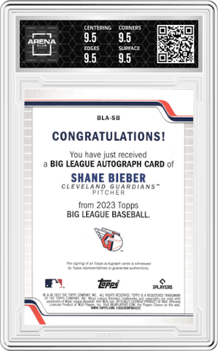 Shane Bieber from the 2023 Topps Big League set featuring a Blue Foil parallel graded by Arena Club and given an overall grade of 9.5.