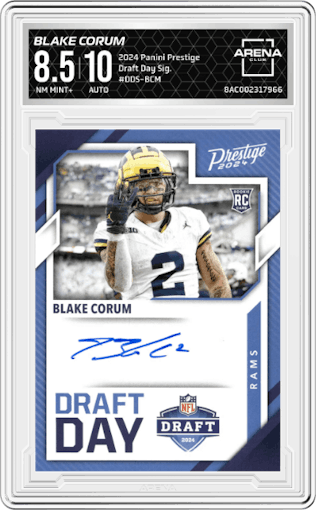 Blake Corum  from the 2024 Panini Prestige  set graded by Arena Club and given an overall grade of 8.5.