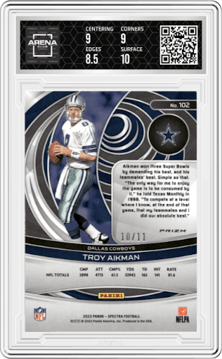Troy Aikman from the 2023 Panini Spectra set featuring a Wave parallel graded by Arena Club and given an overall grade of 9.