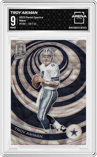 Troy Aikman from the 2023 Panini Spectra set featuring a Wave parallel graded by Arena Club and given an overall grade of 9.