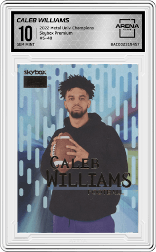 Caleb Williams from the 2022 Skybox Metal Universe Champions Multi-Sport set graded by Arena Club and given an overall grade of 10.