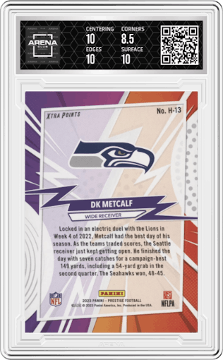 DK Metcalf from the 2023 Panini Prestige set featuring a Xtra Points Blue parallel graded by Arena Club and given an overall grade of 9.