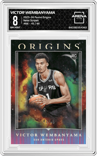 Victor Wembanyama from the 2023-24 Panini Origins set featuring a Neon Stripes  parallel graded by Arena Club and given an overall grade of 8.