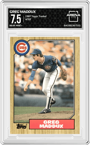 Greg Maddux from the 1987 Topps Traded set graded by Arena Club and given an overall grade of 7.5.