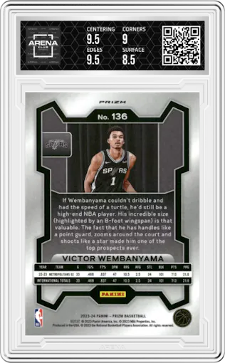 Victor Wembanyama from the 2023-24 Panini Prizm set featuring a Ruby Wave parallel graded by Arena Club and given an overall grade of 9.