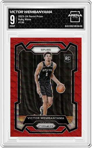 Victor Wembanyama from the 2023-24 Panini Prizm set featuring a Ruby Wave parallel graded by Arena Club and given an overall grade of 9.