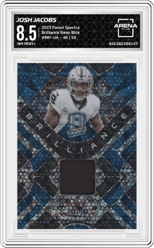 Josh Jacobs from the 2023 Panini Spectra set featuring a Neon Blue parallel graded by Arena Club and given an overall grade of 8.5.