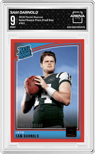Sam Darnold from the 2018 Panini Donruss set featuring a Press Proof Red parallel graded by Arena Club and given an overall grade of 9.