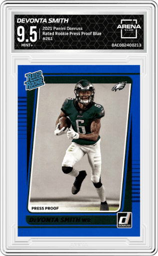 DeVonta Smith from the 2021 Panini Donruss set featuring a Press Proof Blue parallel graded by Arena Club and given an overall grade of 9.5.