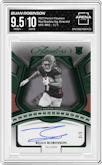 Bijan Robinson from the 2023 Panini Flawless set featuring a Emerald  parallel graded by Arena Club and given an overall grade of 9.5.