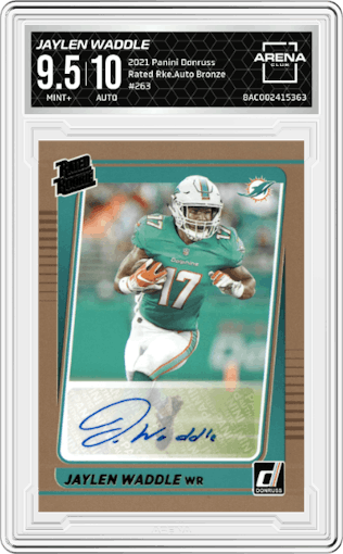 Jaylen Waddle  from the 2021 Panini Donruss set featuring a Bronze parallel graded by Arena Club and given an overall grade of 9.5.