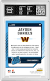 Jayden Daniels from the 2024 Donruss set featuring a Red Pandora parallel graded by Arena Club and given an overall grade of 8.5.