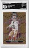 Brock Purdy from the 2024 Panini Mosaic set featuring a Honeycomb parallel graded by Arena Club and given an overall grade of 9.5.