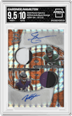Ahmad "Sauce" Gardner/Kyle Hamilton from the 2022 Panini Spectra set featuring a Neon Orange parallel graded by Arena Club and given an overall grade of 9.5.