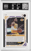 LeBron James from the 2021-22 Panini Donruss Elite  set featuring a Die-Cut Orange parallel graded by Arena Club and given an overall grade of 9.5.