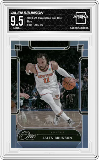 Jalen Brunson from the 2023-24 Panini One and One set featuring a Blue parallel graded by Arena Club and given an overall grade of 9.5.