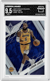 LeBron James  from the 2022-23 Panini Chronicles  set featuring a Blue parallel graded by Arena Club and given an overall grade of 9.5.
