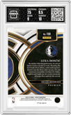 Luka Doncic from the 2023-24 Panini Select  set featuring a Blue Cracked Ice parallel graded by Arena Club and given an overall grade of 8.