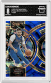 Luka Doncic from the 2023-24 Panini Select  set featuring a Blue Cracked Ice parallel graded by Arena Club and given an overall grade of 8.