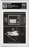 Caris Levert from the 2016-17 Panini Noir set featuring a Patches Black/White parallel graded by Arena Club and given an overall grade of 8.5.