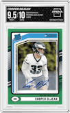 Cooper DeJean from the 2024 Donruss set featuring a Green parallel graded by Arena Club and given an overall grade of 9.5.