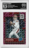 Brock Purdy from the 2022 Panini Donruss Optic set featuring a Pink Velocity parallel graded by Arena Club and given an overall grade of 8.5.